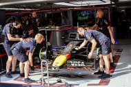 Max Verstappen of the Netherlands with the Red RBPT for the Red Bull Racing Formula One Team, in the pit with the crew of engineers and mechanics team during the practice session ahead of the 2025 Formula 1 Lenovo Hungarian Grand Prix - Source: Getty